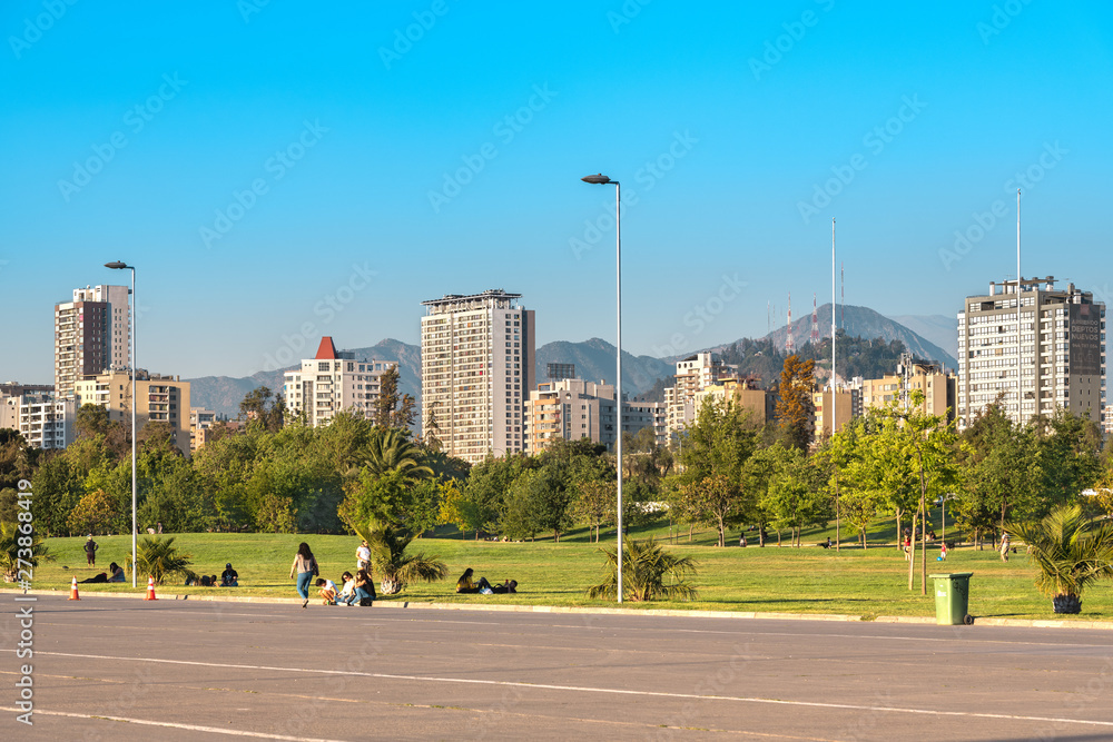 Santiago, Region Metropolitana, Chile - People enjoying a summer evening in Parque O’Higgins at downtown.