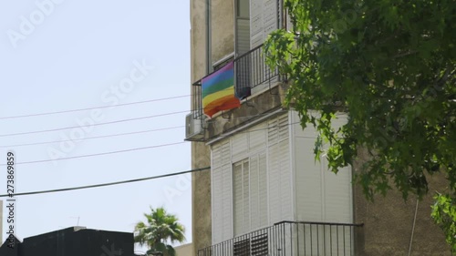 Rainbow flag hung on a balcony in Israel during Gay Parade in Tel Aviv