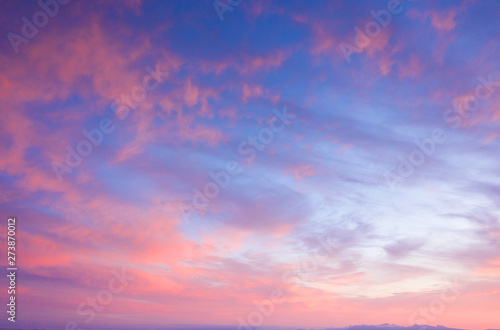 Beautiful sunset clouds in pink colors