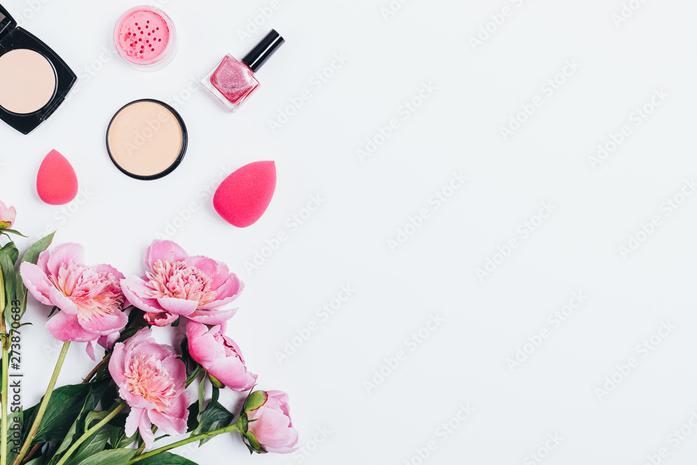 Top view white feminine desktop with beautiful bouquet Top view white feminine desktop with beautiful bouquet