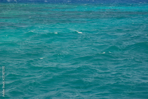 Seascape off Green Island on the Great Barrier Reef, turquoise to blue, deeper water. © Josie Elias