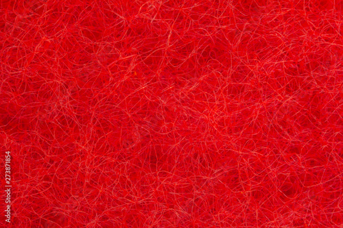 Close-up of red hairy texture. Nanofibers and molecular bonds. Nanostructure Science and modern nanotechnology. Image under the microscope. Background and abstract red pattern.