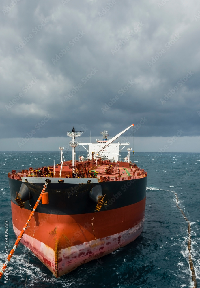 Fototapeta premium Oil tanker is transferring supply to the oil vessel.