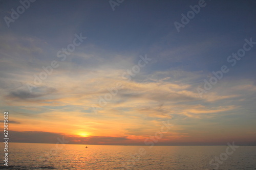 Beautiful sunset on the beach,Sea on the twilight sky,for background.