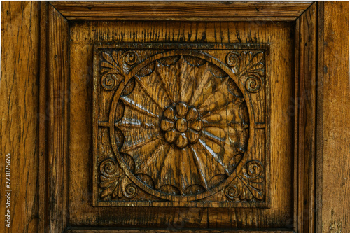 Carved wood pattern, retro element of decor. Exquisite wood carving technology