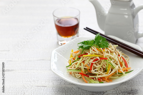 Tofu noodle salad chilled and dressed with sauce  chinese vegan cuisine