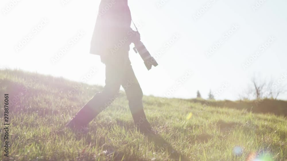 Photographer is taking pictures in nature Photographer is taking pictures in nature