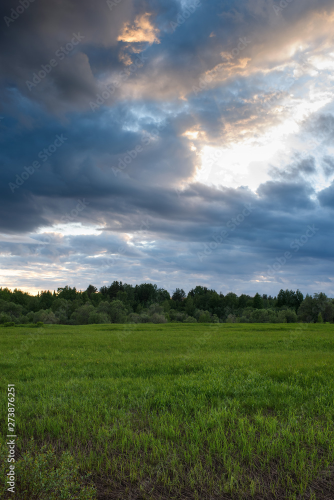 Dramatic sunset on the summer field. Dramatic sunset on the summer field.
