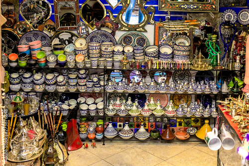 Colorful Moroccan fabrics and handmade souvenirs on the street in the blue city Chefchaouen, Morocco, Africa..