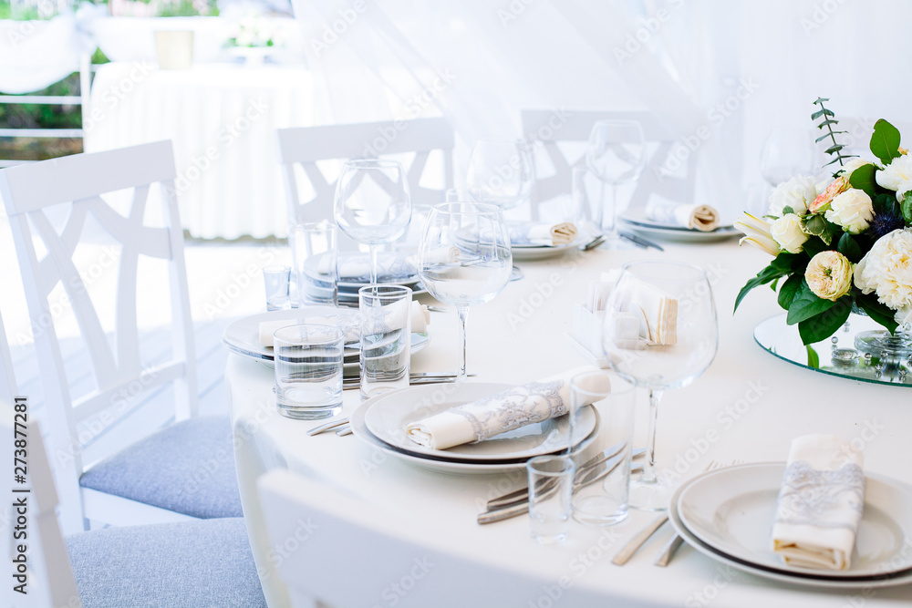 Wedding banquet. Table set for wedding reception Wedding banquet. Table set for wedding reception