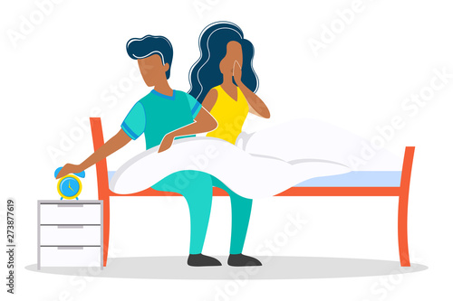 Woman and man waking up together early in the morning