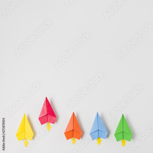 Top view colorful paper planes