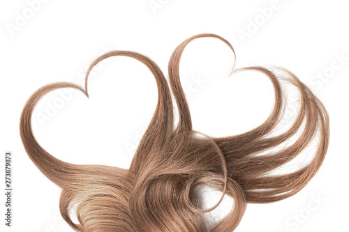 Brown hair isolated on white background. Heart shape