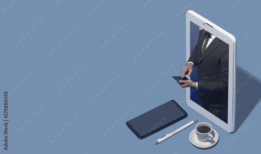 Business executive in a smartphone using his phone
