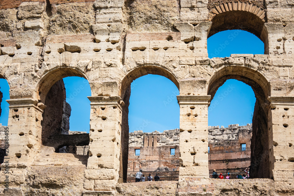 ROME, Italy-: Great Roman Colosseum (Coliseum, Colosseo) also known as the Flavian Amphitheatre. Famous world landmark. Detail of the Arches.