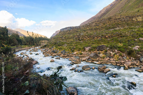 Urubamba or Vilcanota River running alongside the Inca Trail to Machu Picchu, near Cusco, in the Andes of Peru photo