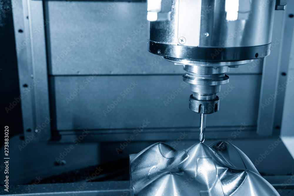 The CNC milling machine cutting the mould parts with the solid ball endmill tool. The surface finishing process cutting by machining center with ball endmill cutter. The CNC milling machine cutting the mould parts with the solid ball endmill tool. The surface finishing process cutting by machining center with ball endmill cutter.