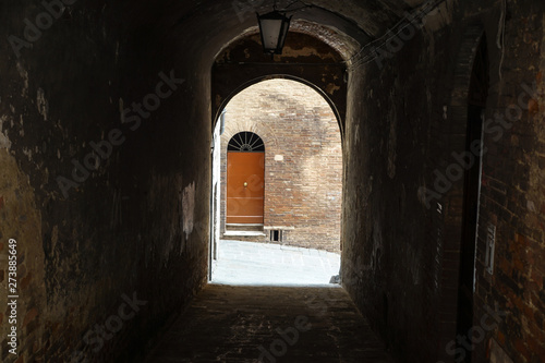 Porch .Passage into the courtyard of an old house in the historic quarter of the city © steuccio79