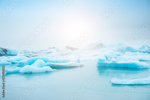 Blue icebergs in Jokulsarlon glacial lagoon, southern Iceland. Famous travel destination © smallredgirl