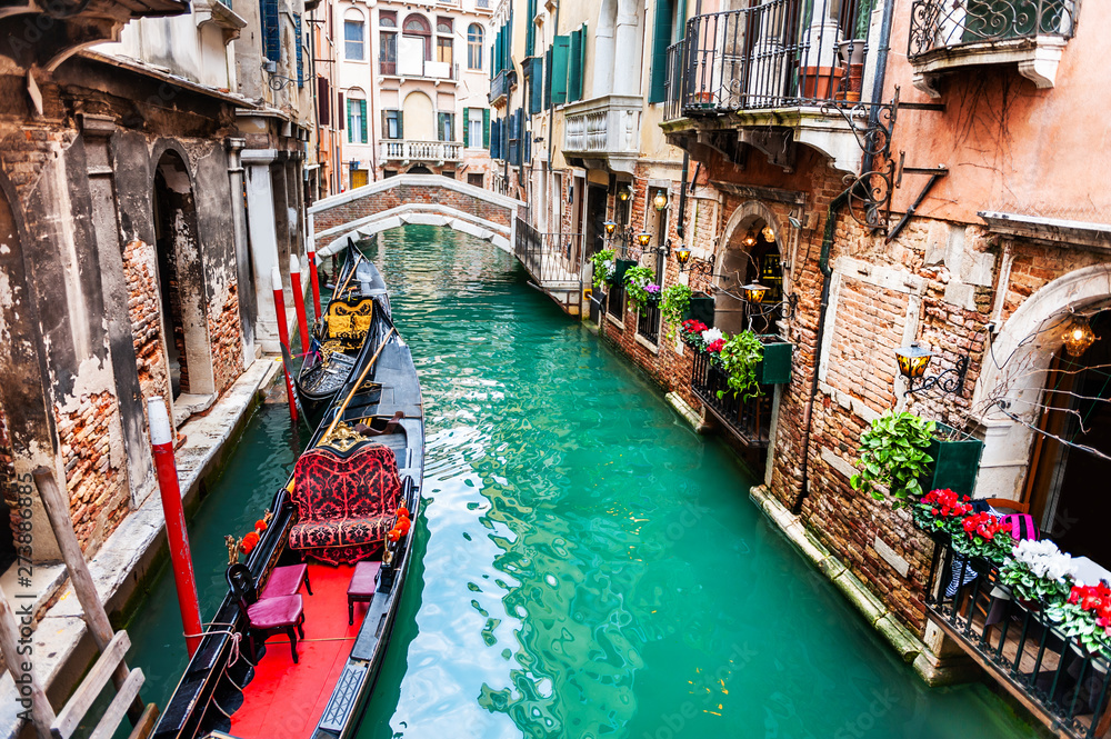 Scenic canal with gondolas and old architecture in Venice, Italy. famous travel destination - obrazy, fototapety, plakaty 