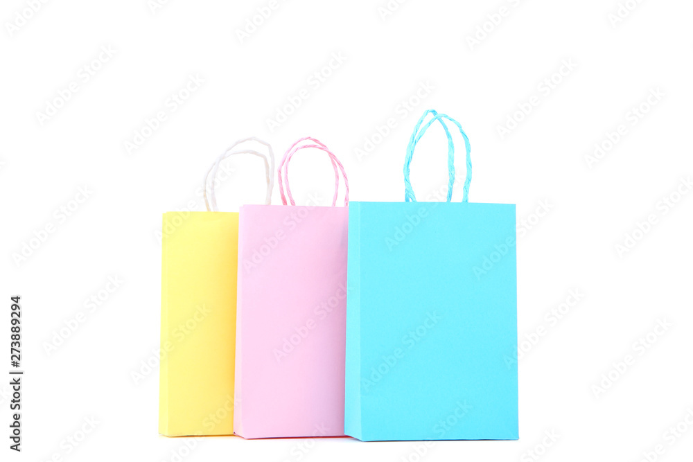 Small paper shopping bags isolated on white background Small paper shopping bags isolated on white background