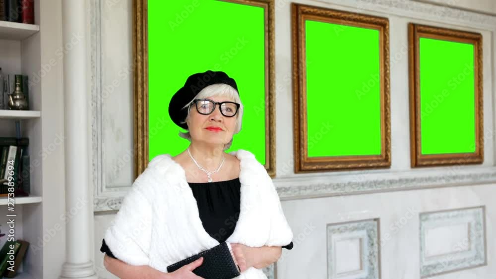 Portrait of rich elderly woman in art gallery Portrait of rich elderly woman in art gallery