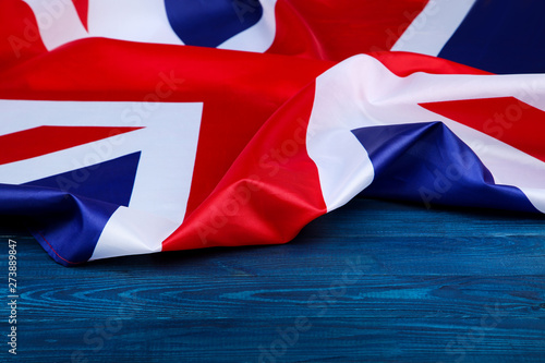 British flag on blue wooden table