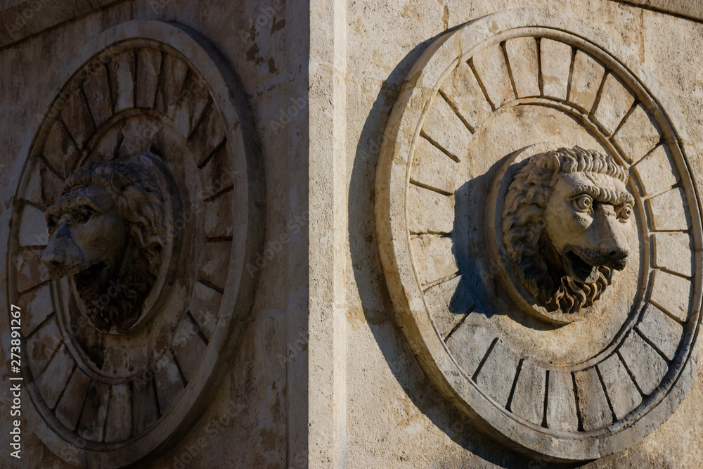 Stone statues of lions on the fountain in the centre of Belgrade