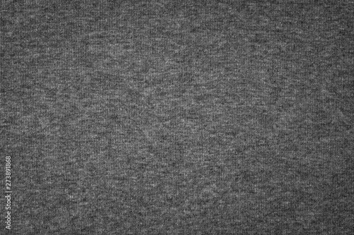 Grey cotton texture background. Detail of sweater fabric surface.