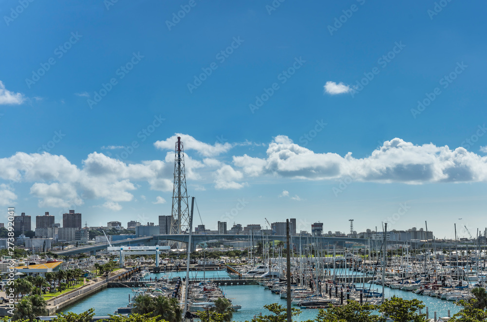 Leisure boats lined in the Ginowan harbor marina seen from Okinawa conversion center