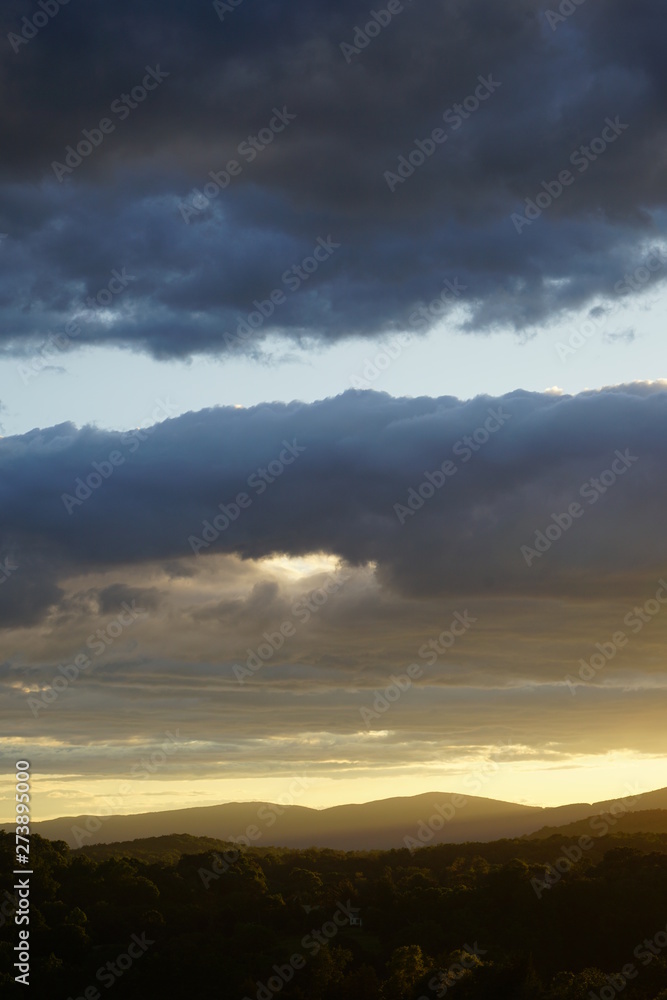 Sunset with Clouds over the Blue Ridge Mountains Sunset with Clouds over the Blue Ridge Mountains