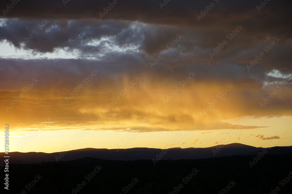 Sunset Over Mountains with Clouds