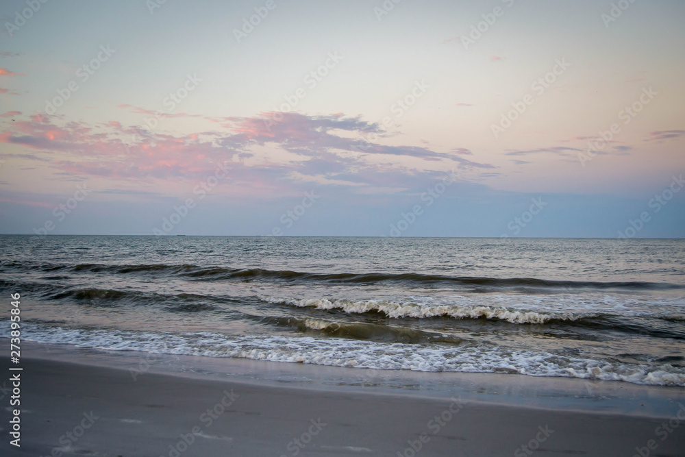 Atlantic ocean waves in sunset
