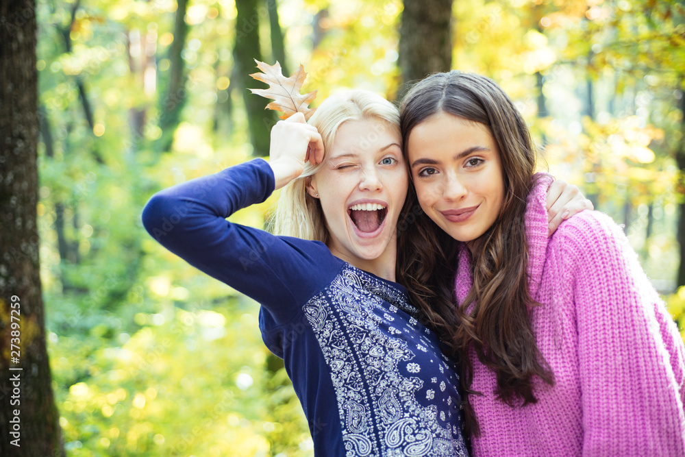 They radiate coziness. Enjoy warmth. Women enjoy sunny day outdoors. Pretty women long hair nature background. Fashion concept. Catch last beams of sunlight. Warmth and sunlight. Feeling warmth