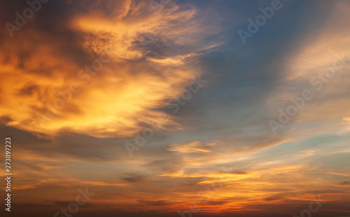 Blue sky and cloud in orange Sunset background. Natural and sky concept