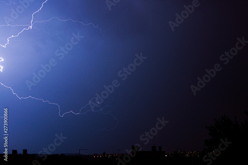 Lightning on the sky during summer storm 