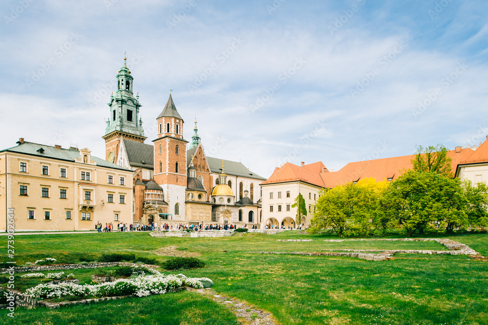  Krakow, Poland - April 26, 2019: view at wawel castle with tourists.
