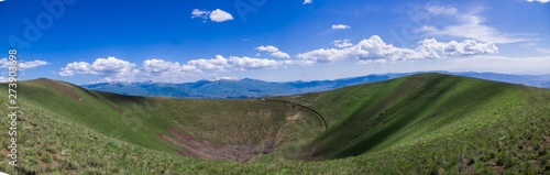 Bild auf Leinwand extinct volcano crater in summer day