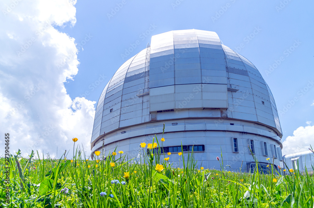 Fototapeta premium Large azimuth telescope in the mountains of Arkhyz on a Sunny summer day
