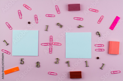 Stationery for the school of pink and red color, members and mathematical symbols on a pink background. Space for text.