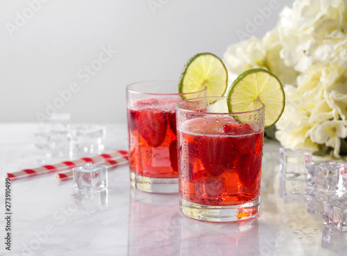 Fresh strawberry cocktails with mint and lime
