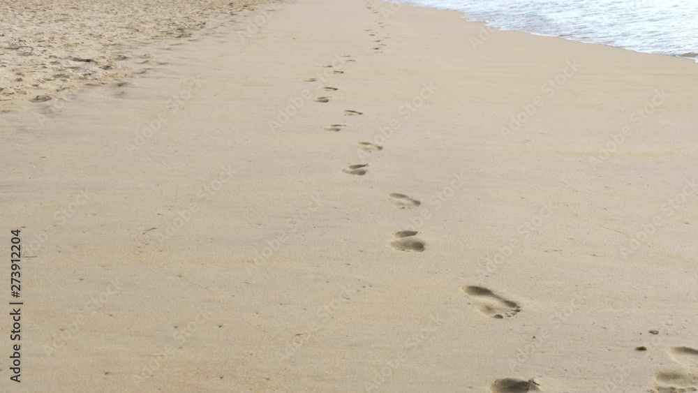 Footprints on the beach Footprints on the beach
