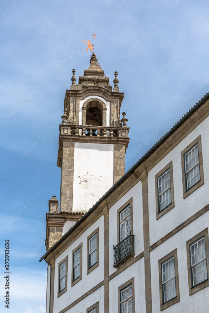 Viseu / Portugal - 04 16 2019 : View of a tower at the Church of Mercy, baroque style monument, architectural icon of the city of Viseu, in Portugal