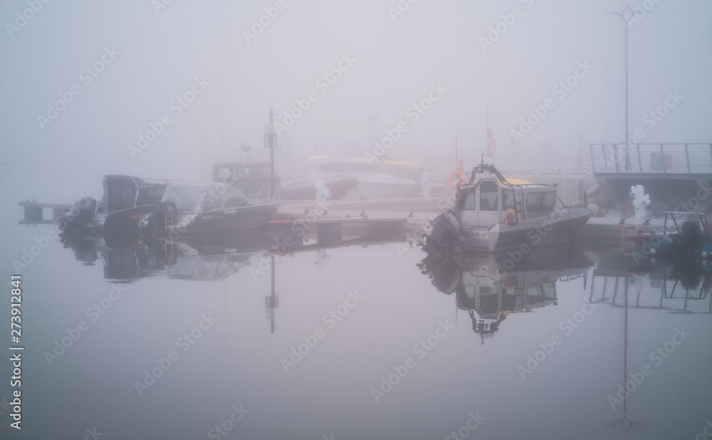 Fototapeta premium Fishing boats in fog