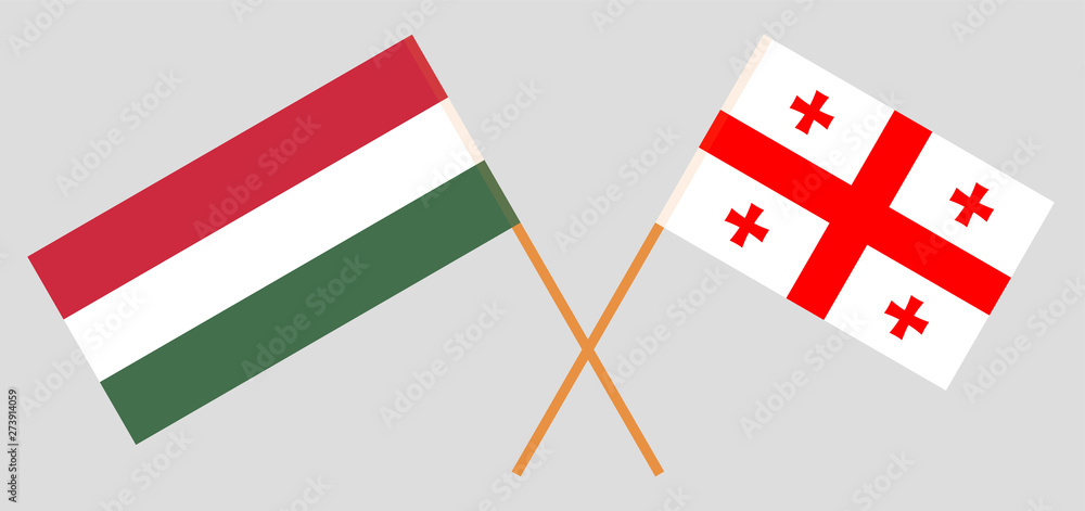 Georgia and Hungary. Crossed Georgian and Hungarian flags