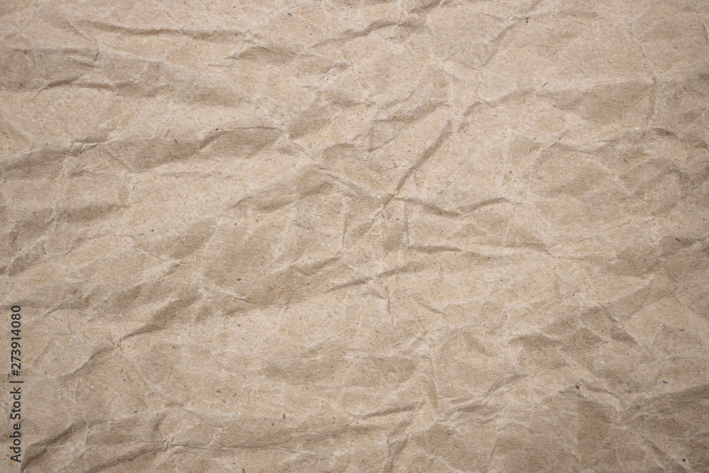 Fototapeta premium background of crumpled brown paper texture