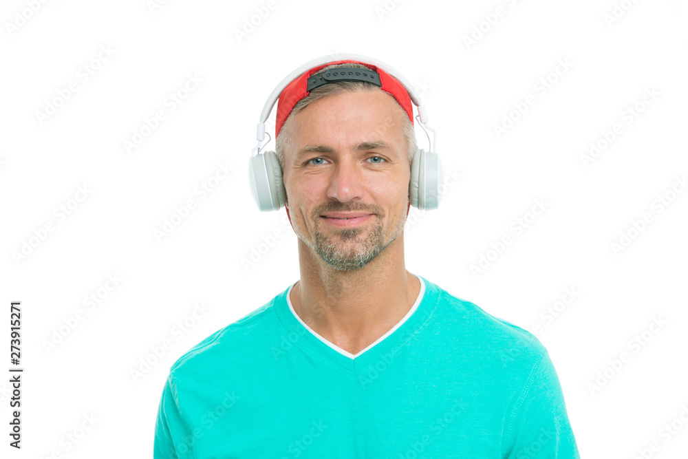 Enjoying audio book. Modern earphones concept. Audio education. Audio track. Man handsome unshaven hipster listening audio file using headphones gadget. Listen music for motivation and inspiration Enjoying audio book. Modern earphones concept. Audio education. Audio track. Man handsome unshaven hipster listening audio file using headphones gadget. Listen music for motivation and inspiration