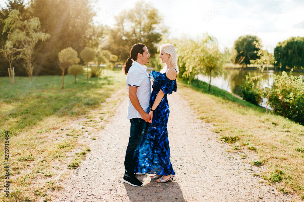 Beautiful loving couple outdoor activity. Italian man with his caucasian girlfriend emotional relationships. Beautiful loving couple outdoor activity. Italian man with his caucasian girlfriend emotional relationships.