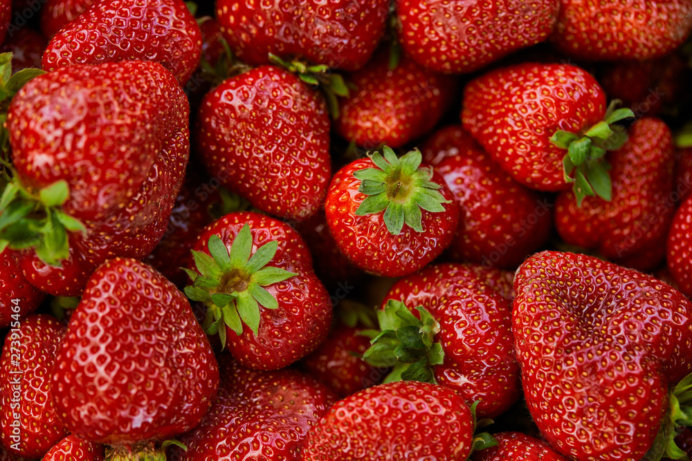 top view of background with red fresh strawberries top view of background with red fresh strawberries