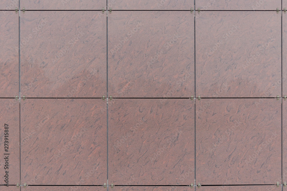 Building with red square ventilated panel facade. Rainscreen is ...